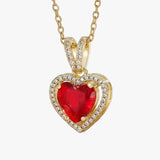 Collana con pendente a cuore in oro e rubino
