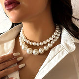 Collana con Perle a Doppio Statement
