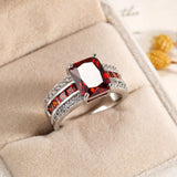 Anello in Argento con Rubino a Due Tubi