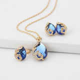 Set di collana e orecchini in oro con cristallo blu