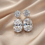 Orecchini in oro bianco con maestosa zirconia