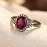 Velloria™ - Anello Halo in Argento e Rubino