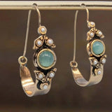 Orecchini a cerchio in perla cabochon argento classico