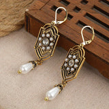Orecchini Vintage con Perle Incastonate in Oro