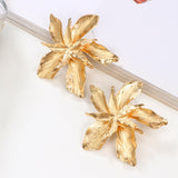 ORECCHINI BLOMSTER CON ANELLO RADIANTE