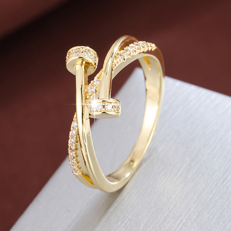 Anello incrociato in oro bianco con zirconi