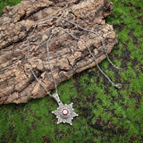Collana con pendente a stella in argento e rubino