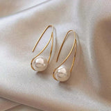 Eleganti orecchini con perle