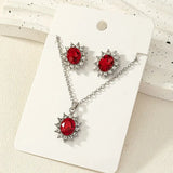 Set di gioielli in argento e rubino floreale