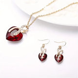Set di Gioielli Cuore Intrecciato in Oro e Rubino