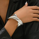 Bracciale intrecciato in oro bianco opaco