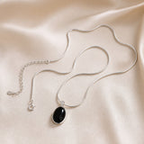 Raffinata collana ovale in oro bianco