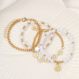 Set di 4 Bracciali Impilabili con Perle e Margherite