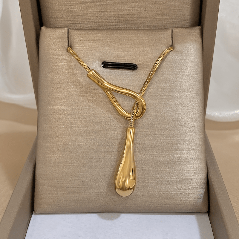 Collar vintage de oro blanco con colgante de gota