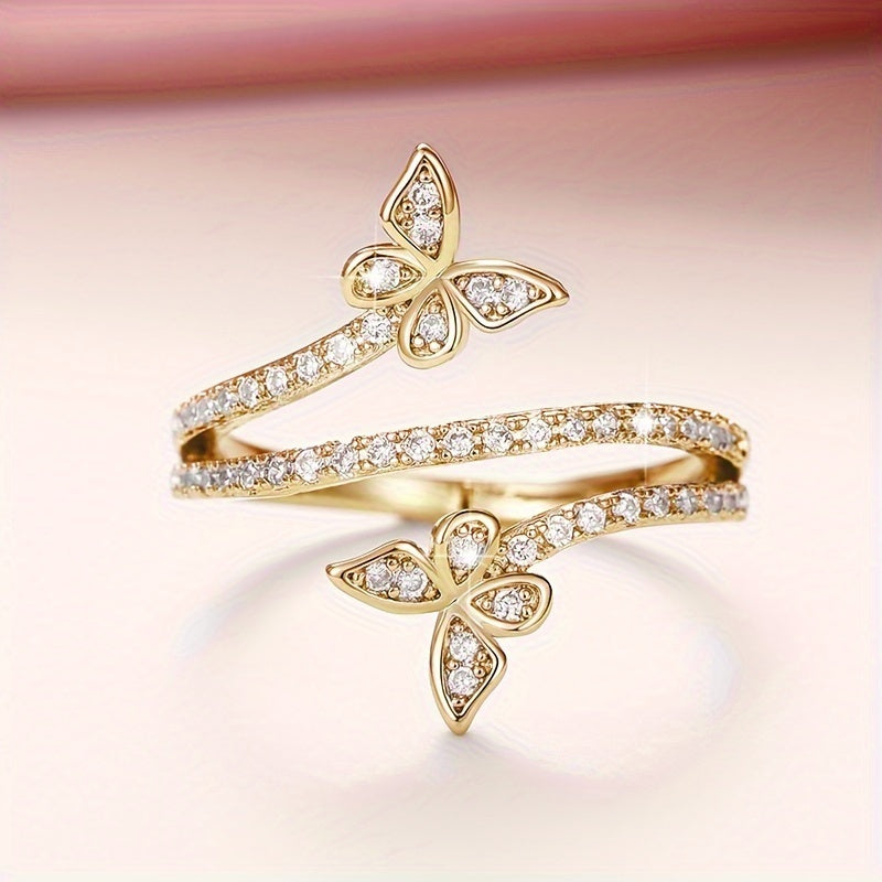 Anello con Farfalle e Zirconi Incastonati in Oro Bianco