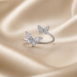 Anello in Oro Bianco con Due Farfalle in Zirconia