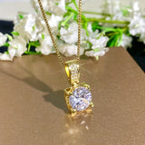 Collana in oro bianco con ciondolo in zirconia cubica