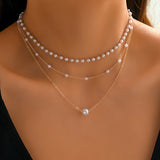 Il set di collane Trinity Pearl Layer