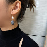 Orecchini a Goccia con Perle di Pavone