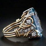 Damiana™ - Anello Vintage in Oro con Zirconia Blu a Fasce Sovrapposte