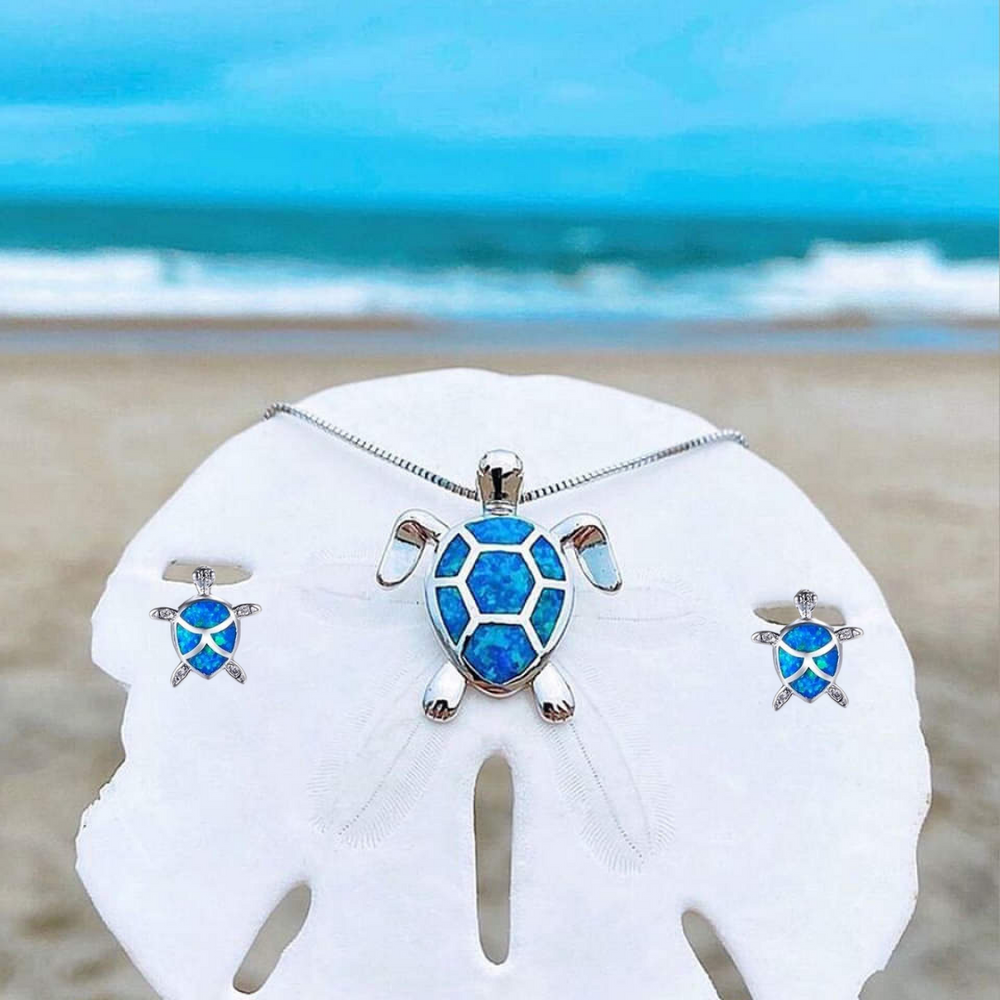 Collar y aretes con temática de tortugas marinas en ópalo y plata