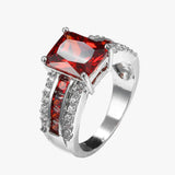 Anello in Argento con Rubino a Due Tubi