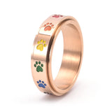 Anello Antistress Rotante – Acciaio Inossidabile con Zampe Arcobaleno