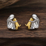 Aretes de puño en plata y oro de dos tonos