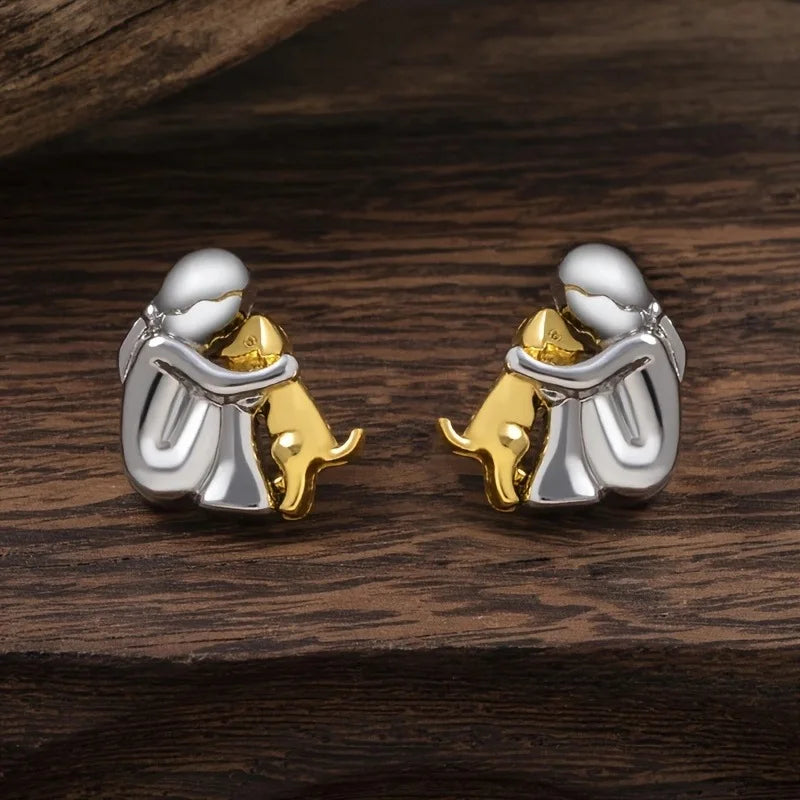 Aretes de puño en plata y oro de dos tonos