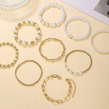Set di 9 Braccialetti Impilabili in Perle Premium