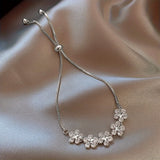 Bracciale in Oro Bianco con Zirconi a Forma di Fiore