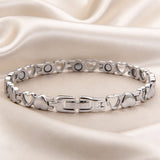 Raffinato bracciale in oro bianco con ciondolo a forma di cuore