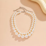 Collana con Perle a Doppio Statement