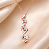 Collana in oro bianco con pendente a forma di infinito e zirconi
