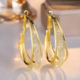 Orecchini di Lusso in Mesh di Zirconia e Oro Bianco