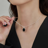 Raffinata collana ovale in oro bianco