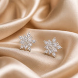 Orecchini in oro bianco a forma di fiocco di neve