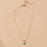 Collana con pendente in acquamarina dorata
