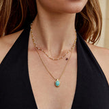 Collana con pendente in acquamarina dorata