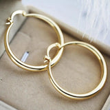 Orecchini a cerchio in oro Radiant Store