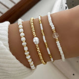 Set di 4 Bracciali con Accenti di Perle Dorate